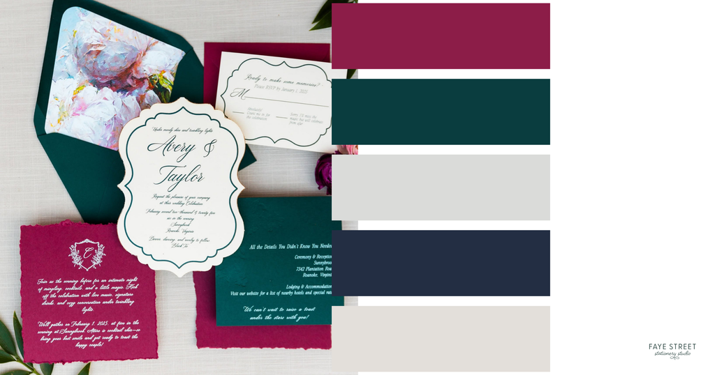 Bold wedding color palette with raspberry pink, deep teal, navy and ivory swatches alongside custom-shaped wedding invitations and floral envelope liners.
