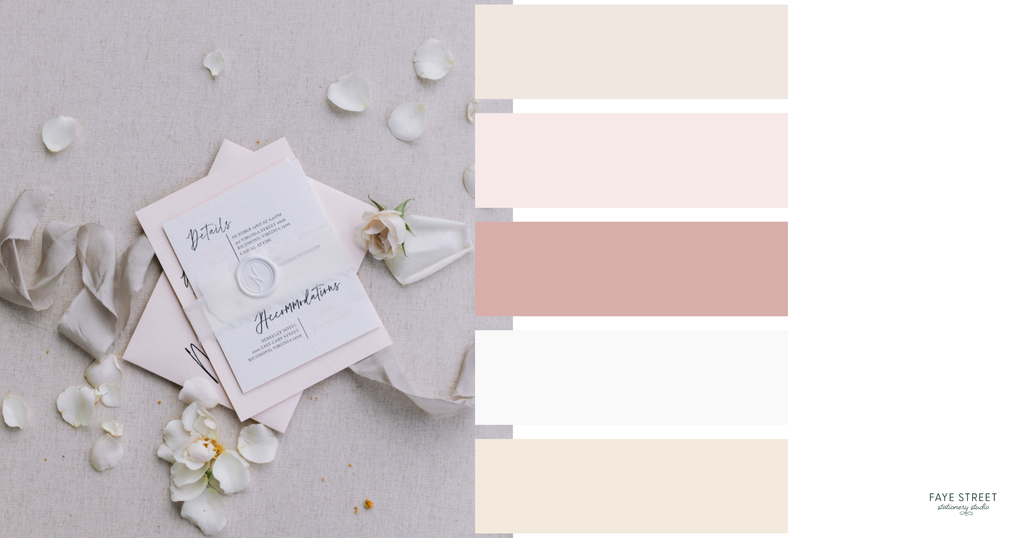 Minimalist wedding color palette with ivory, blush pink, dusty rose and champagne swatches beside wedding stationery with a white wax seal and silk ribbon.